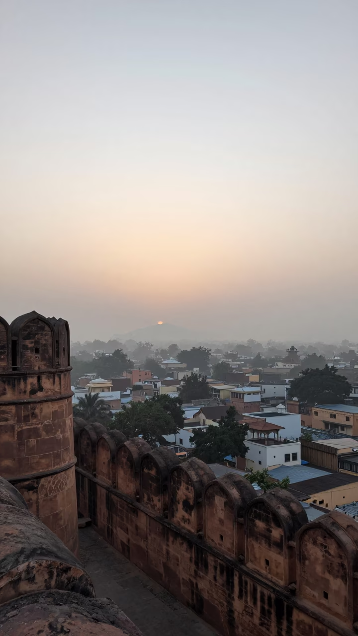 Misty Dawn Horizon Over Jaipur Fort Walls and Rooftops in in Jaipur, India