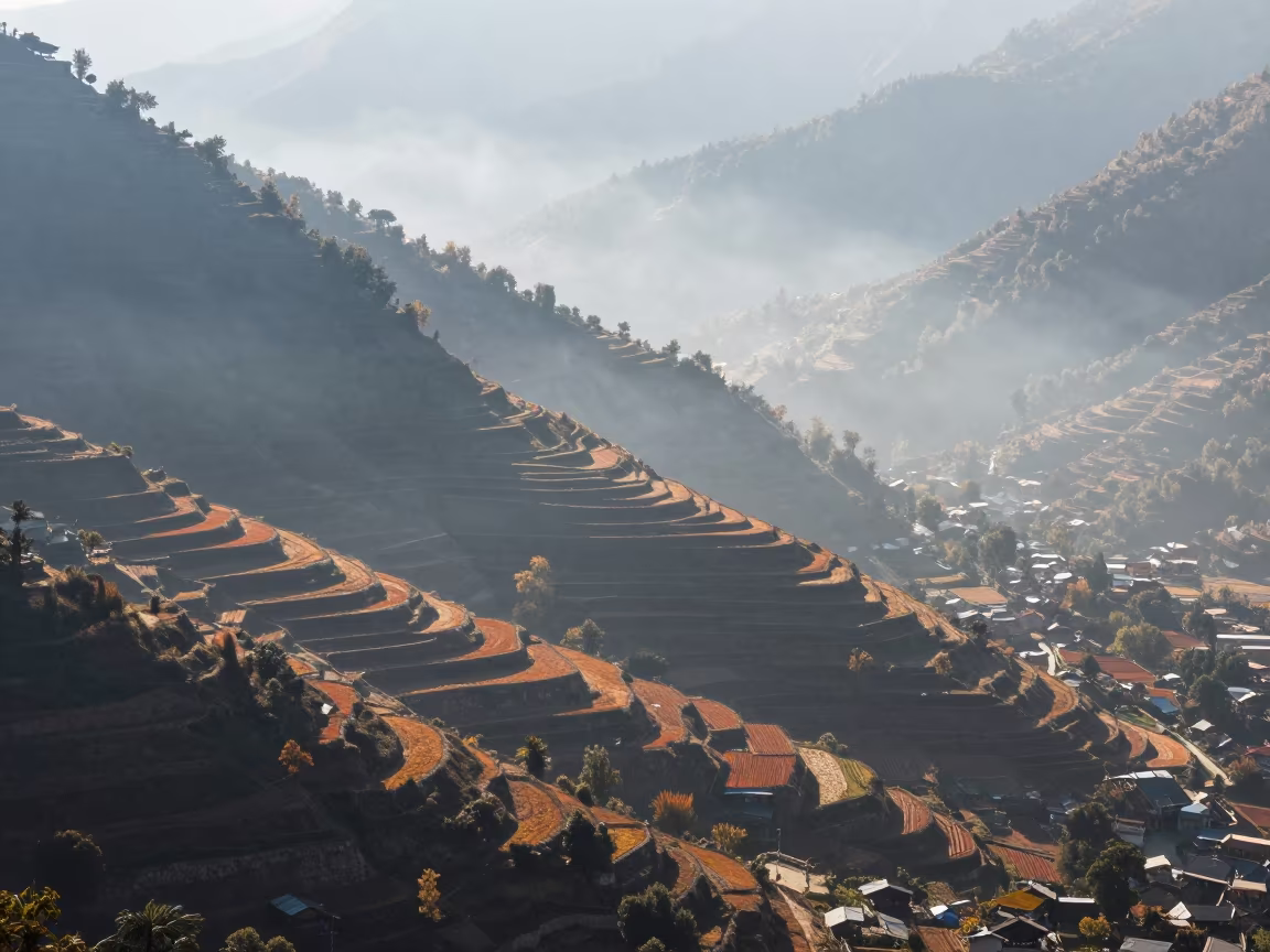 Misty Mountain Terraces Above Pokhara Rooftops in high above patterned rooftops near Pokhara