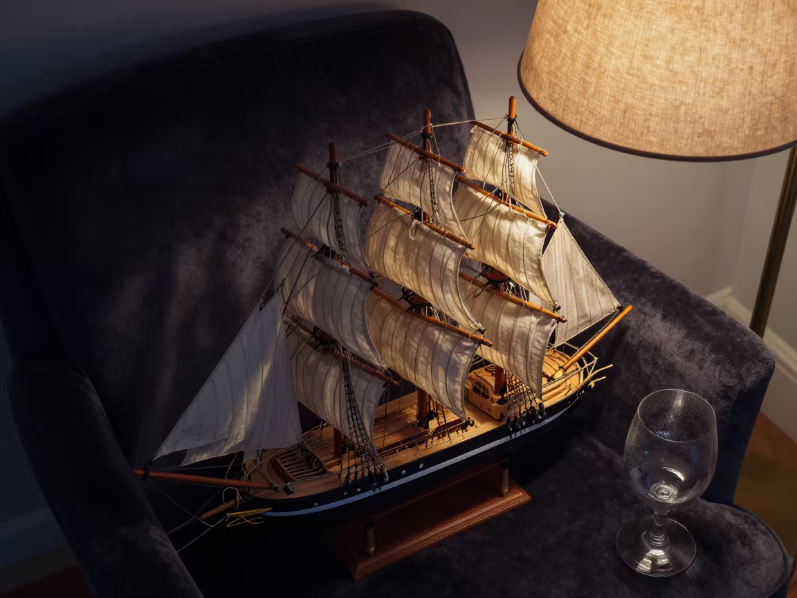 Model Ship on Velvet Chair Under Lamp in on a velvet chair in Saharanpur
