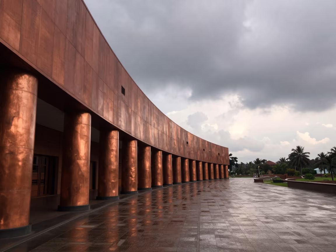Monsoon Dusk Curved Museum Facade Kerala in along a colonnaded facade in Kerala