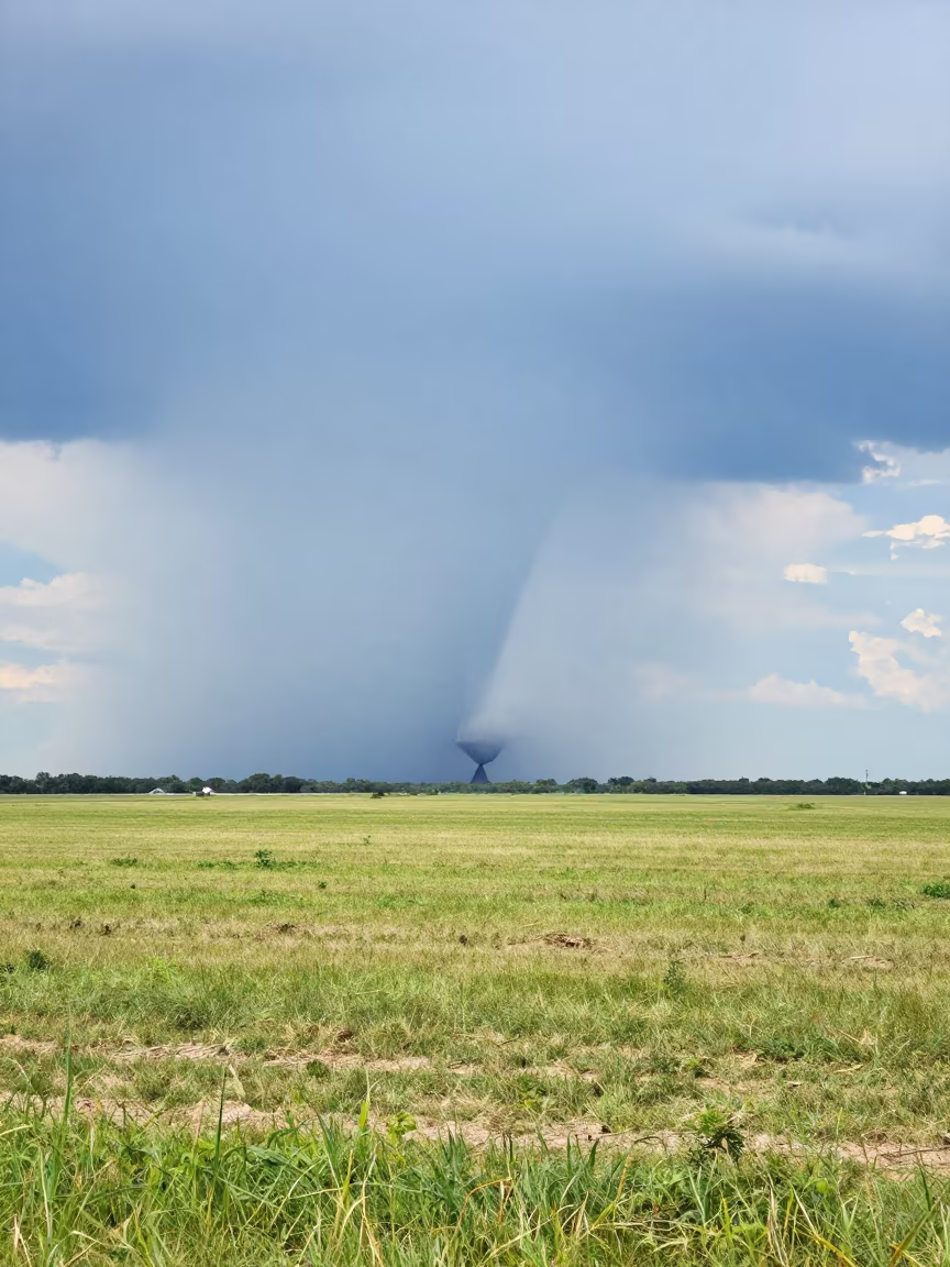 Monsoon Tornado on Stormy Great Plains in across a storm-bright plain near Villahermosa