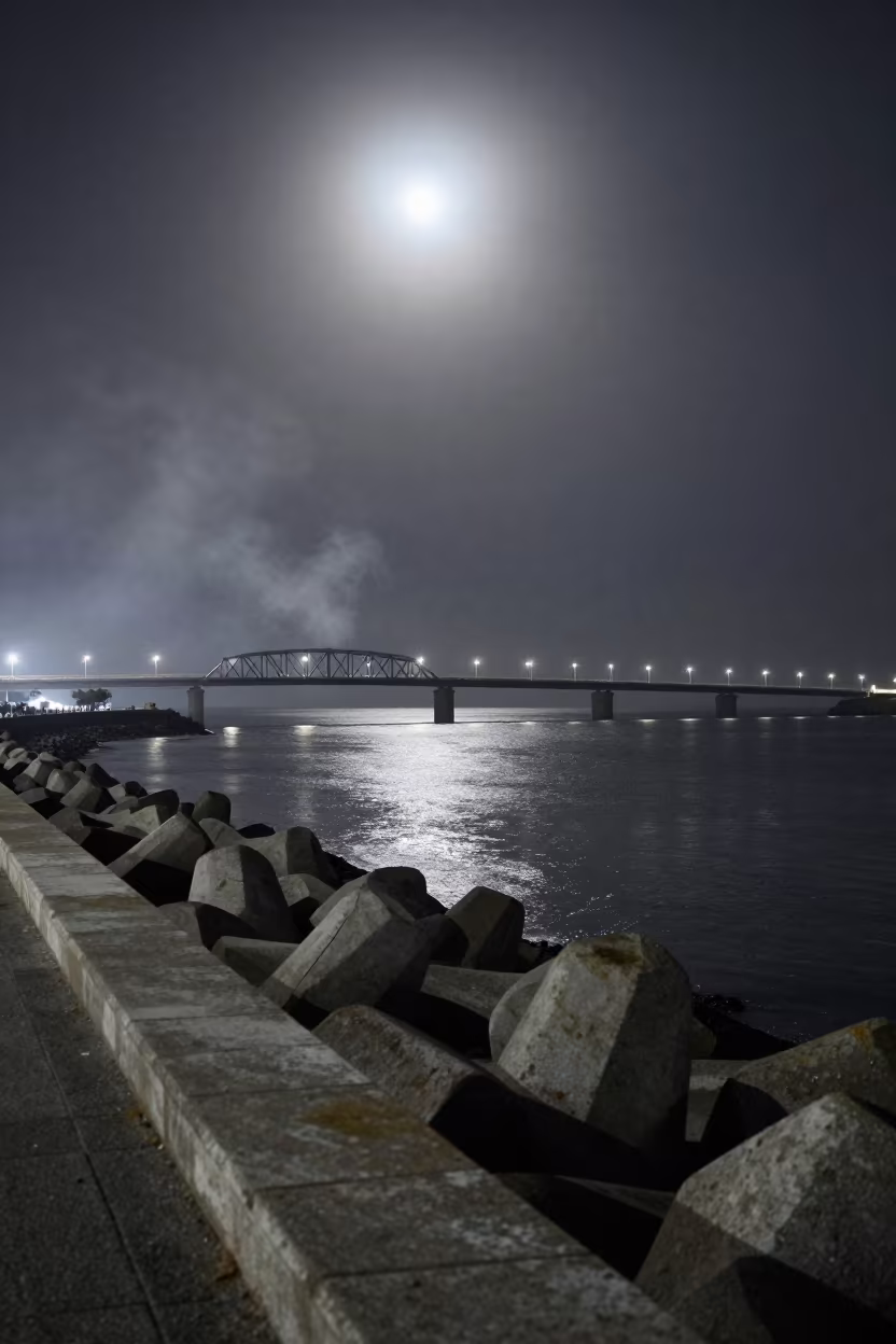 Moonlit Bridge and Smoke Over San-Pédro Breakwater in from a moonlit breakwater near San-Pédro