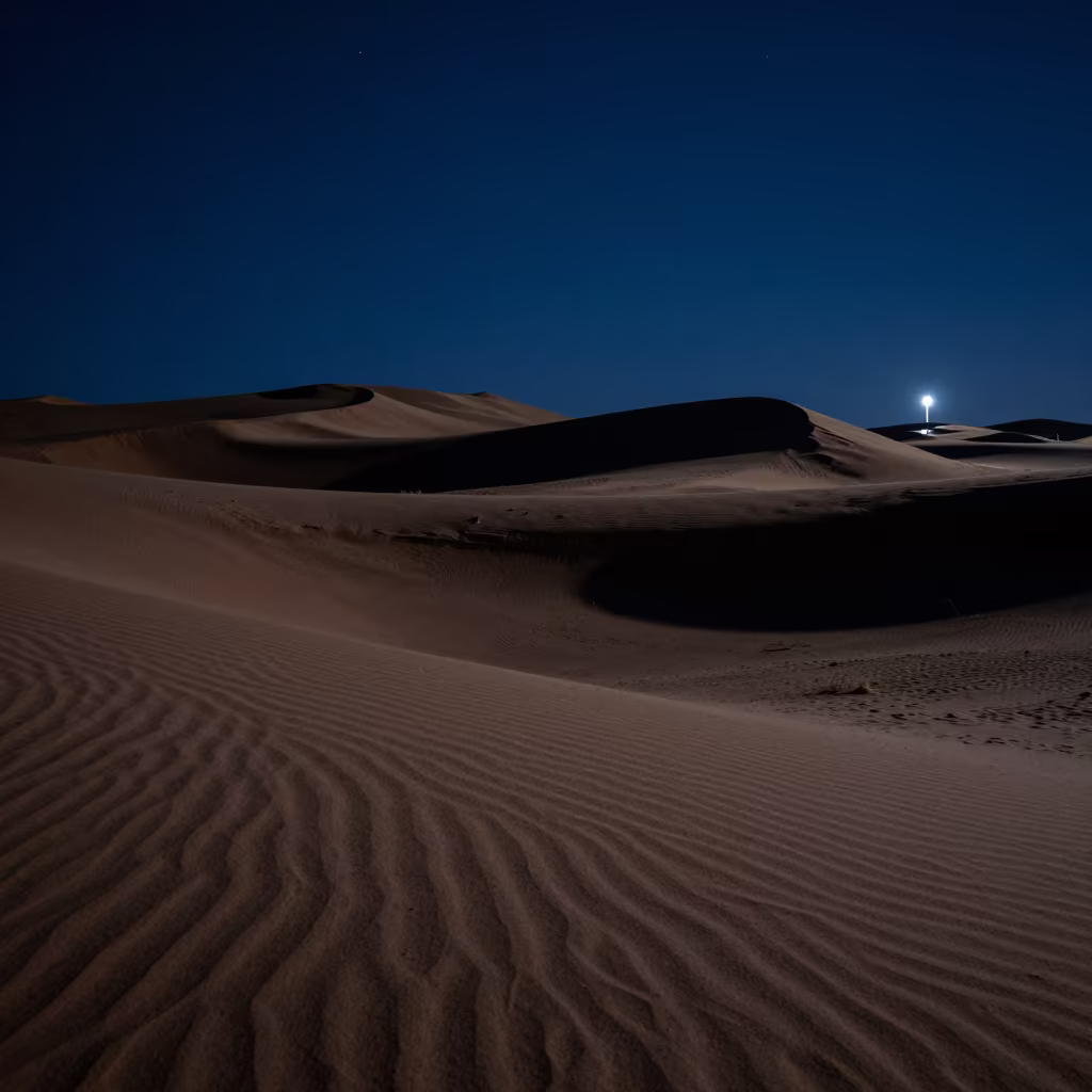 Moonlit Dunes Cast Blue Shadows Over Harbor in beside a lantern-dotted harbor in New Mexico