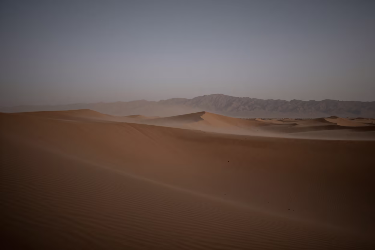 Moonlit Sandstorm Veiling Stars Over Dunes in near Isfahan