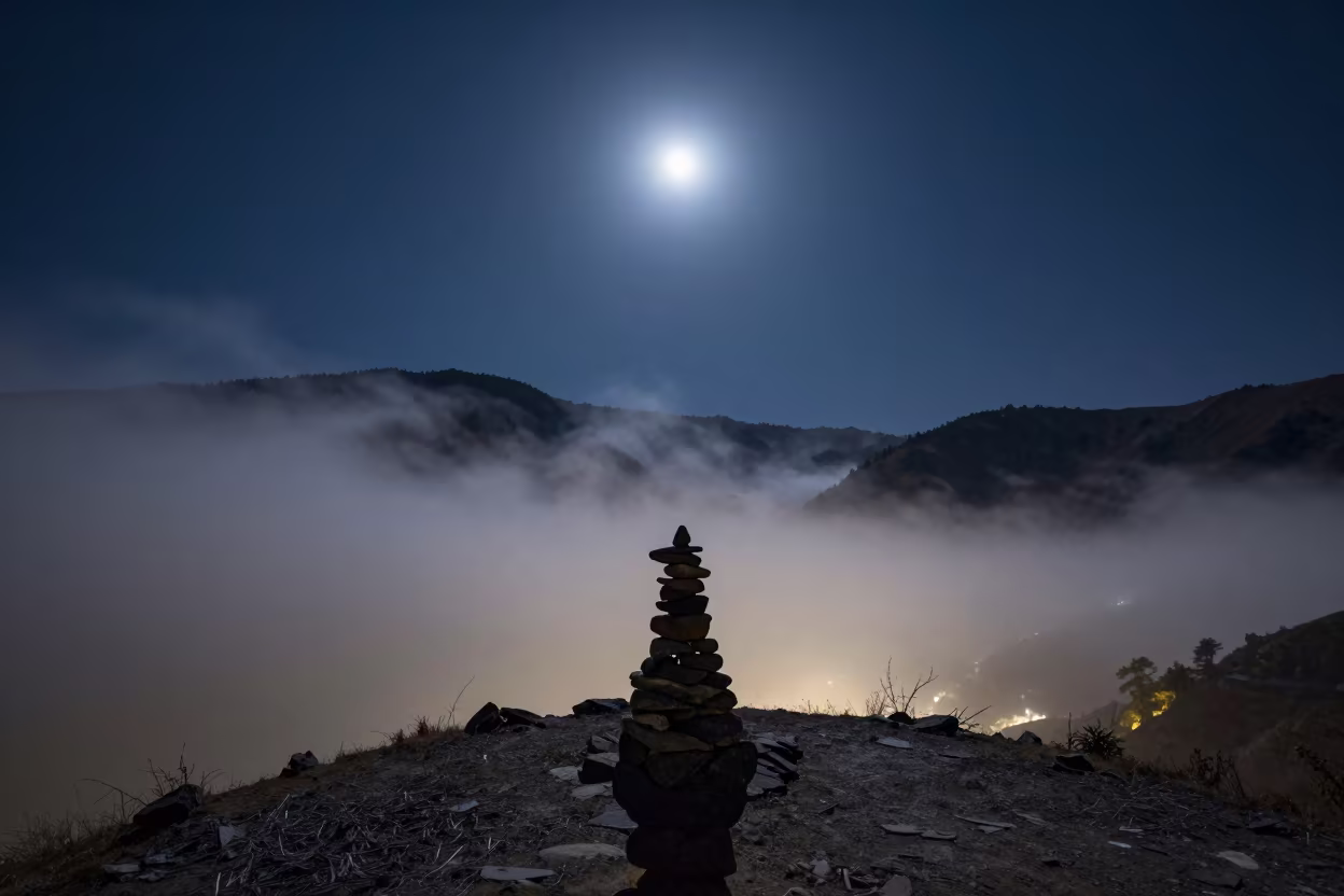Moonlit Surf and Mist Above Kathmandu Pass in beside a summit cairn above the tree line near Kathmandu