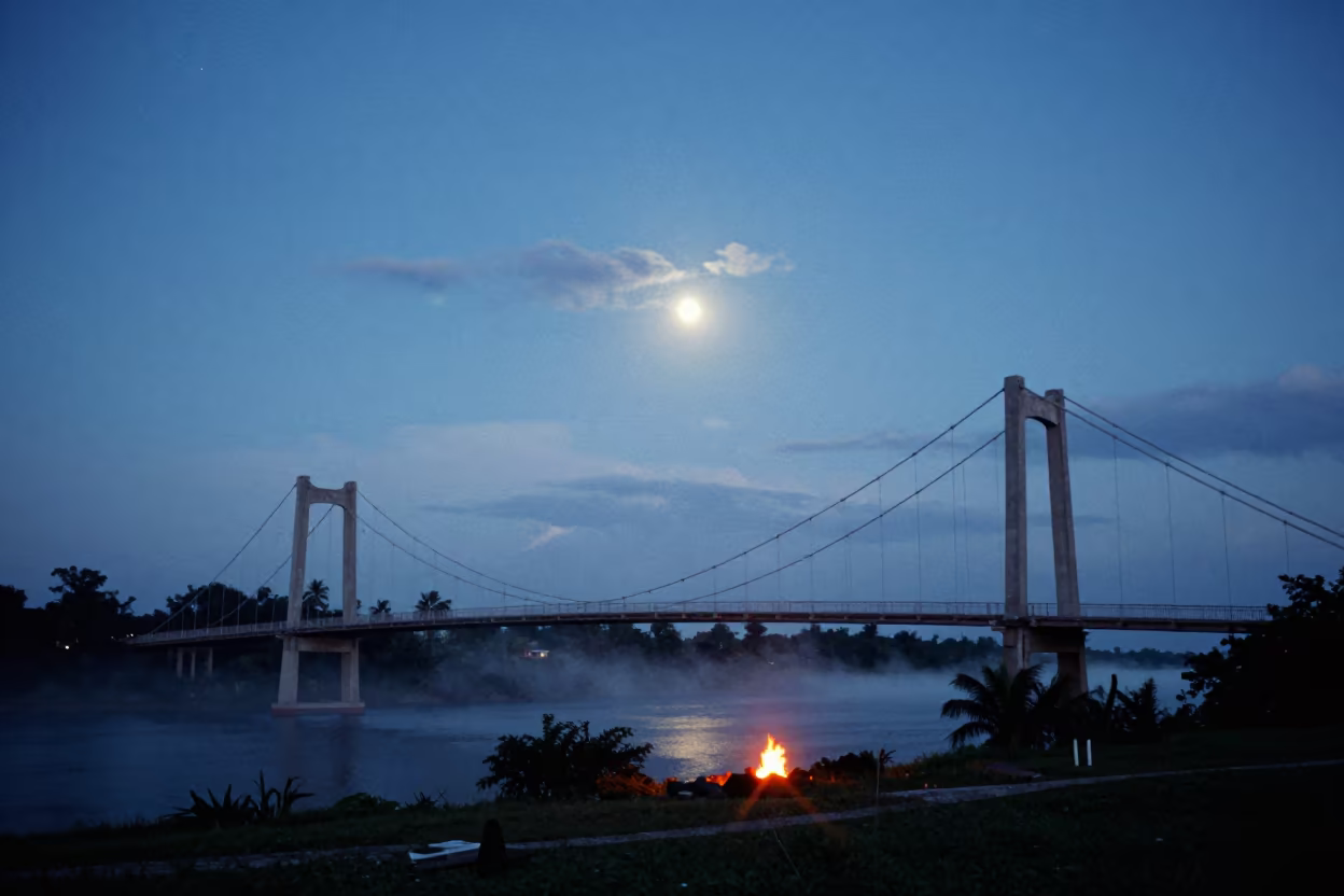 Moonrise Over Belize Suspension Bridge Twilight in beneath thin cloud gaps and stars in Belize
