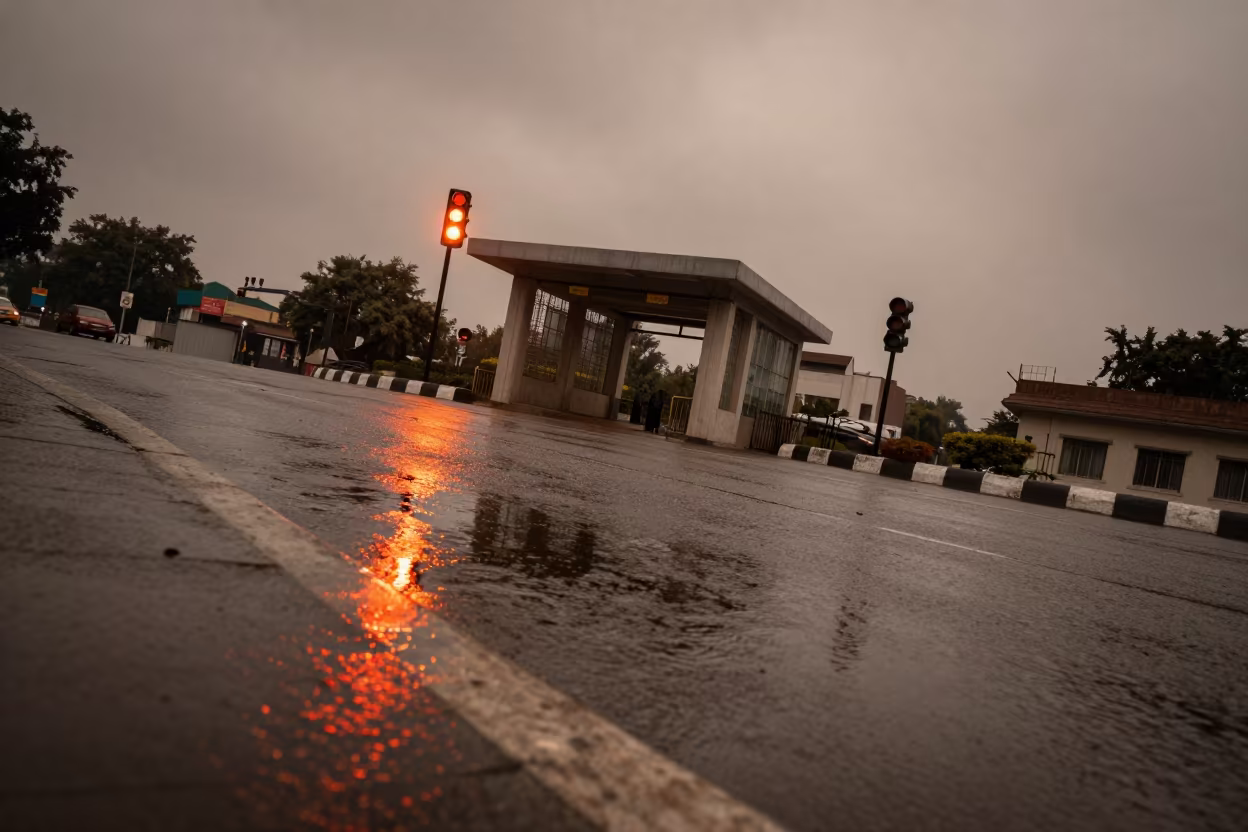 Moradabad Street Puddle Traffic Light Reflection in outside a metro entrance in Moradabad