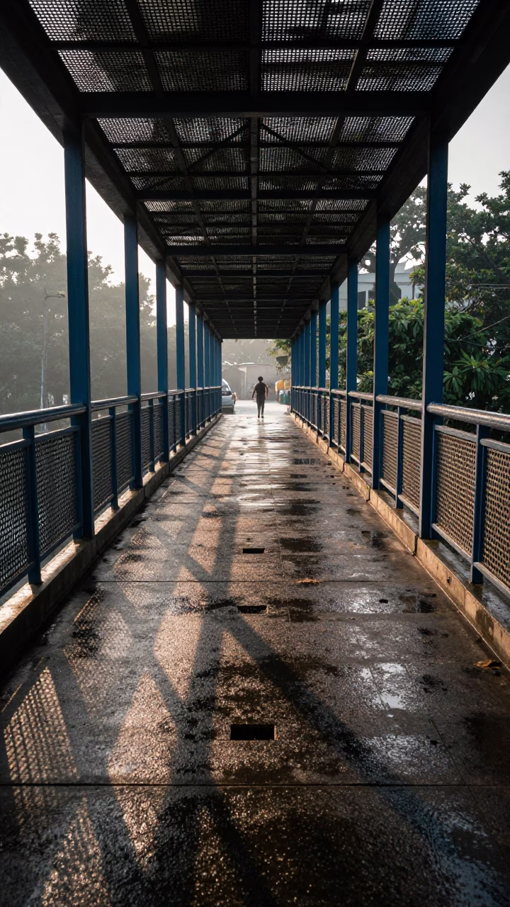 Morning Commute on Kolkata Pedestrian Overpass with Wet Footsteps and Urban Morning Light in in Kolkata, India