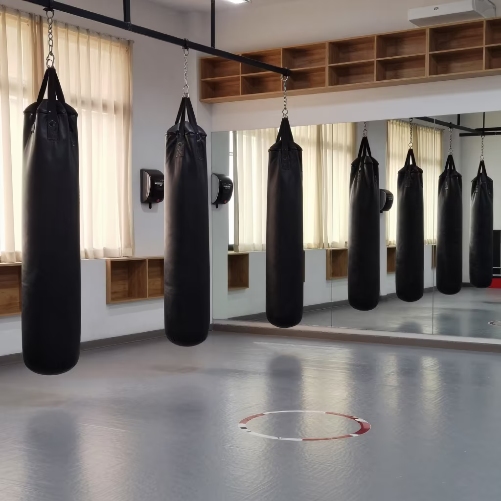 Morning Fitness Row with Gloves and Mirrors in inside a spin studio under class lights in Sana'a