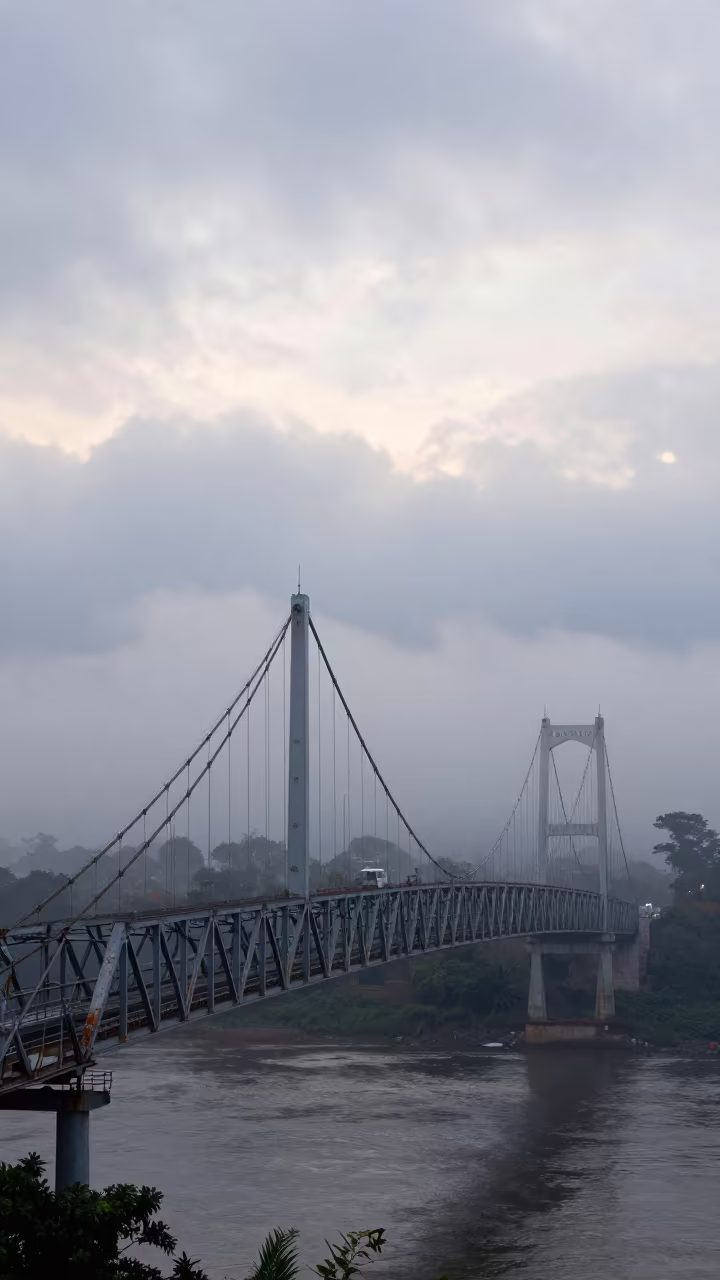 Morning Fog Over Suriname Suspension Bridge in through low marine fog in Suriname