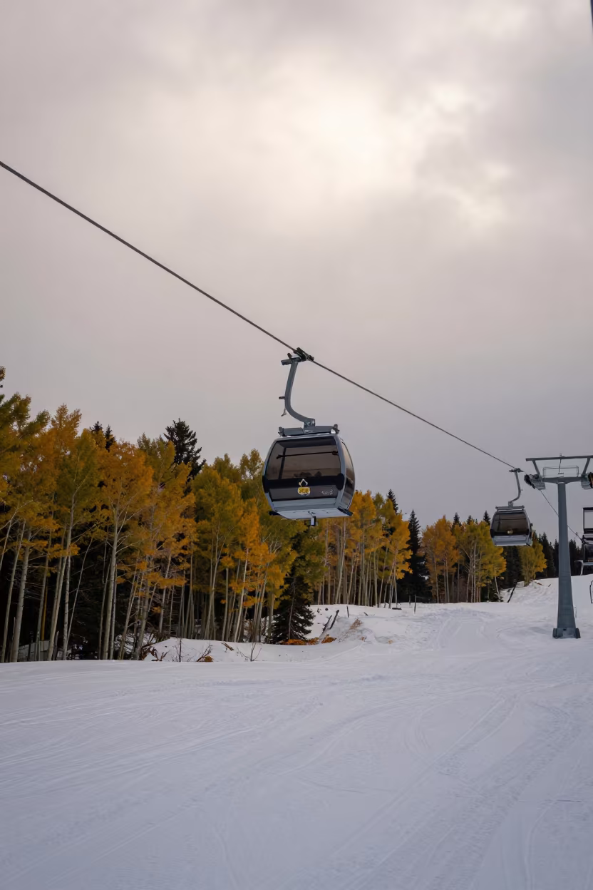 Morning Gondola Over Autumn Banff Slopes in on a groomed ski slope before opening near Banff