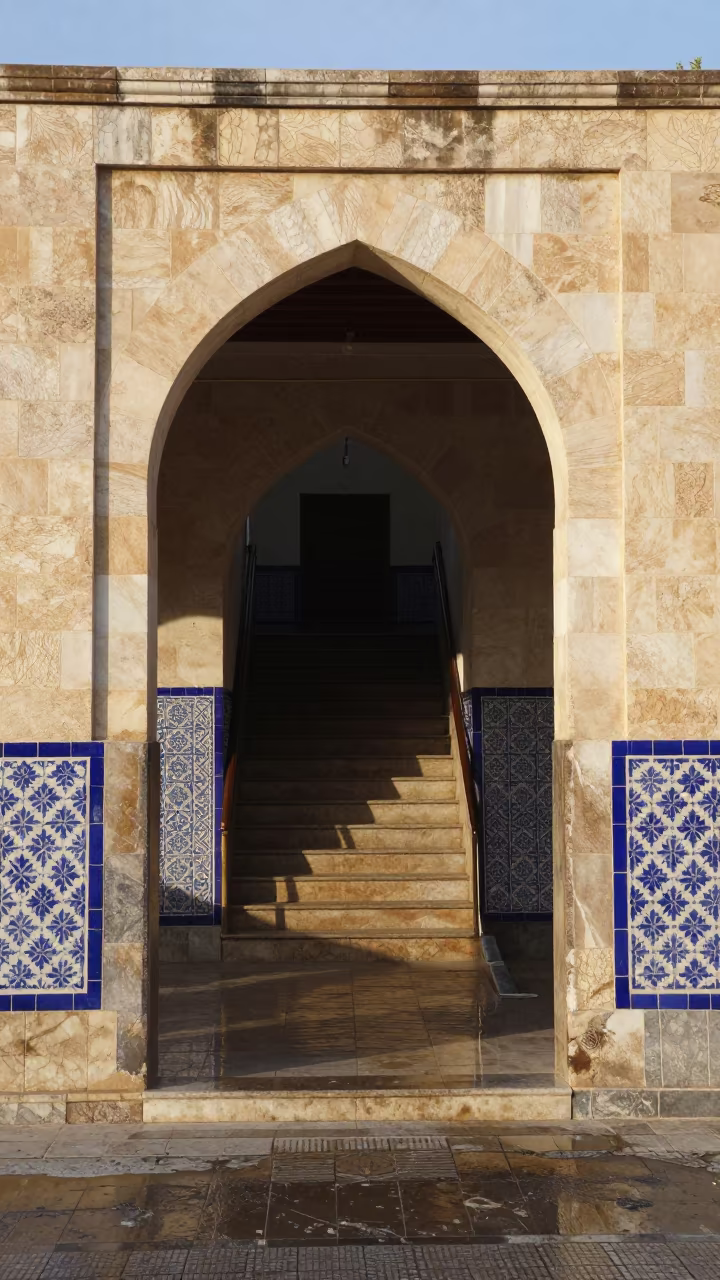 Morning Light on Benghazi Tiled Stair Hall Arch in inside a tiled stair hall in Benghazi