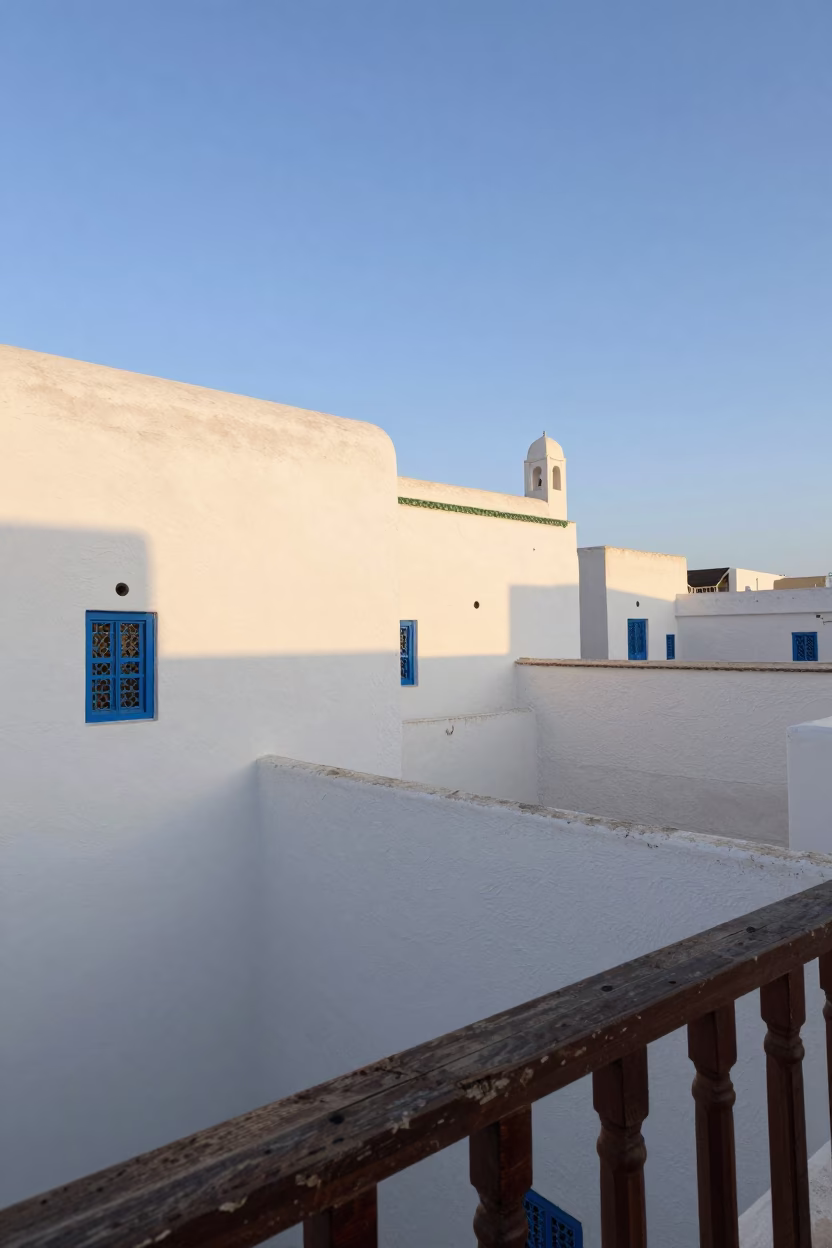 Morning Light Illuminating Tunis Medina White Walls and Coiled Rope on Balcony in in Tunis, Tunisia