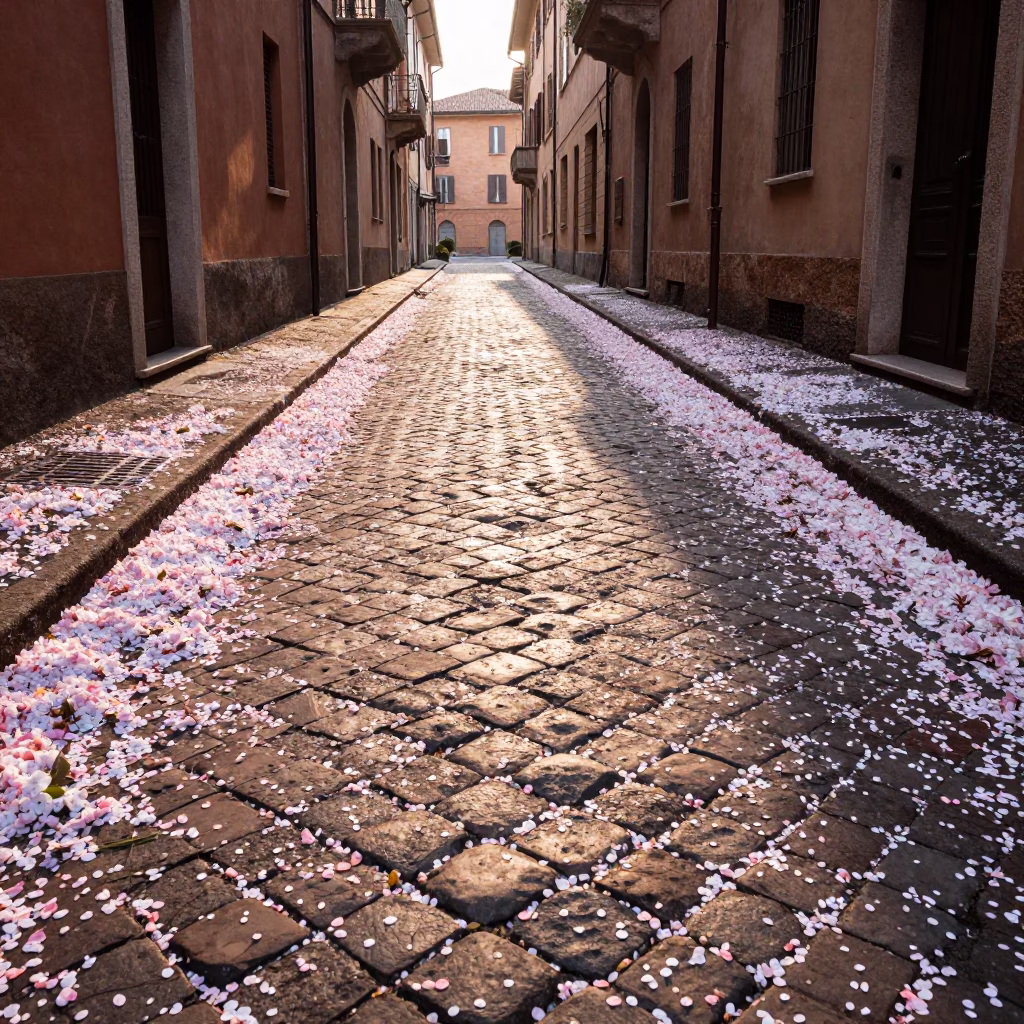 Morning Light on Bologna Cobblestones with Flower Petals and Vintage Street Details in in Bologna, Italy