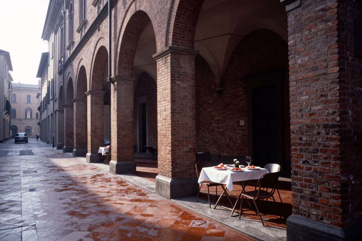 Morning light on Bologna porticoes with charcuterie and condensation in in Bologna, Italy