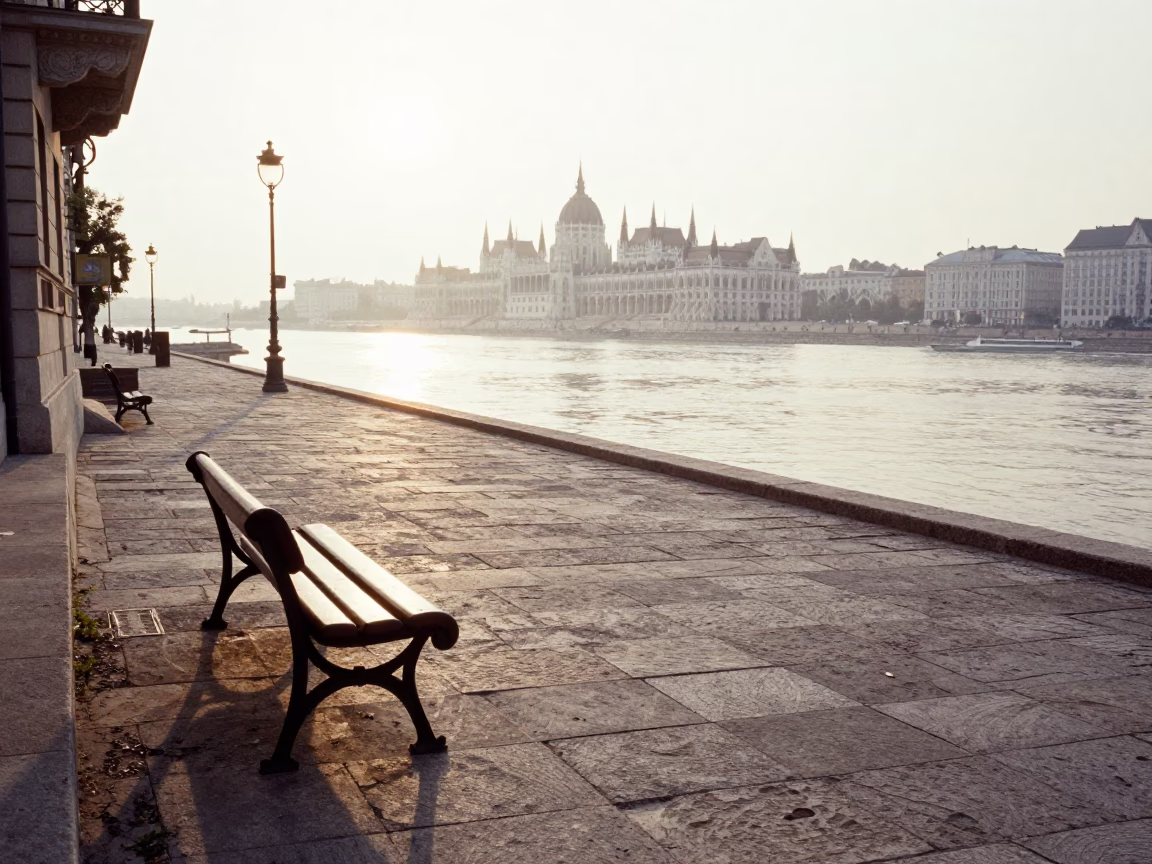 Morning Light on Budapest Danube Promenade with Stone Bench and Window Pollen in in Budapest, Hungary