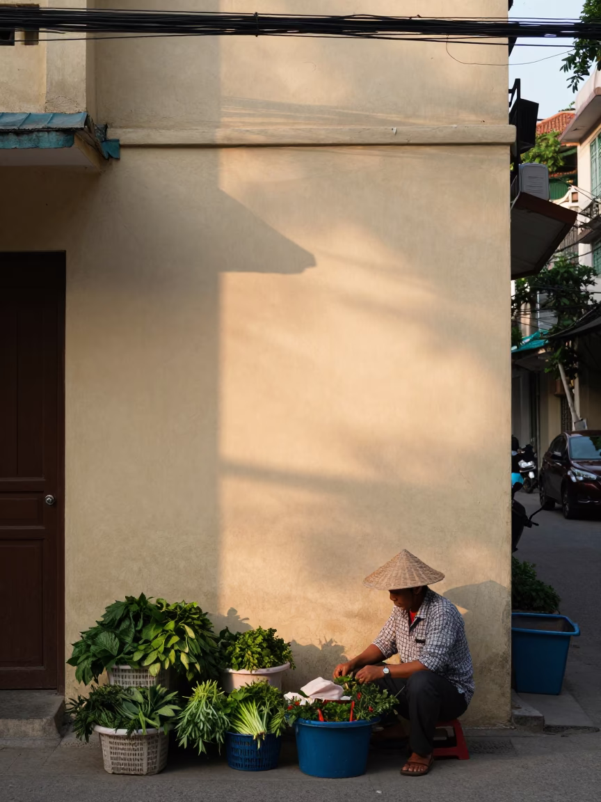 Morning Light on Hanoi Plaster Wall and Street Life in 1970s Vietnam in in Hanoi, Vietnam