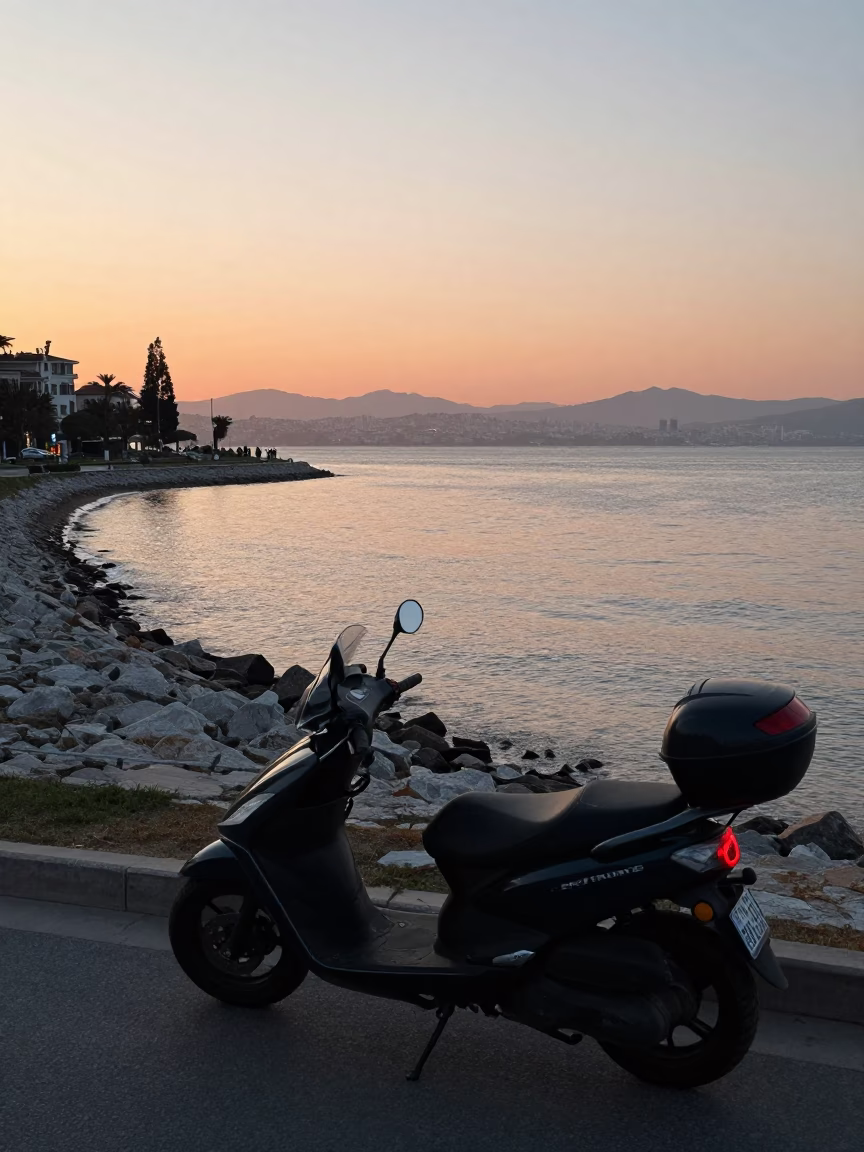 Morning Light on Izmir Coastline with Parked Motorcycle and Coastal Cafe in in Izmir, Turkey