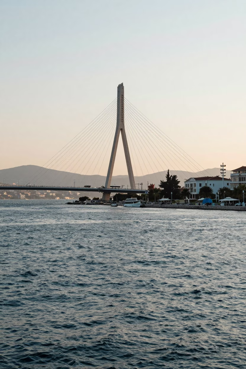 Morning light on Izmir's Kordon promenade with cable-stayed bridge and coffee stall in in Izmir, Turkey