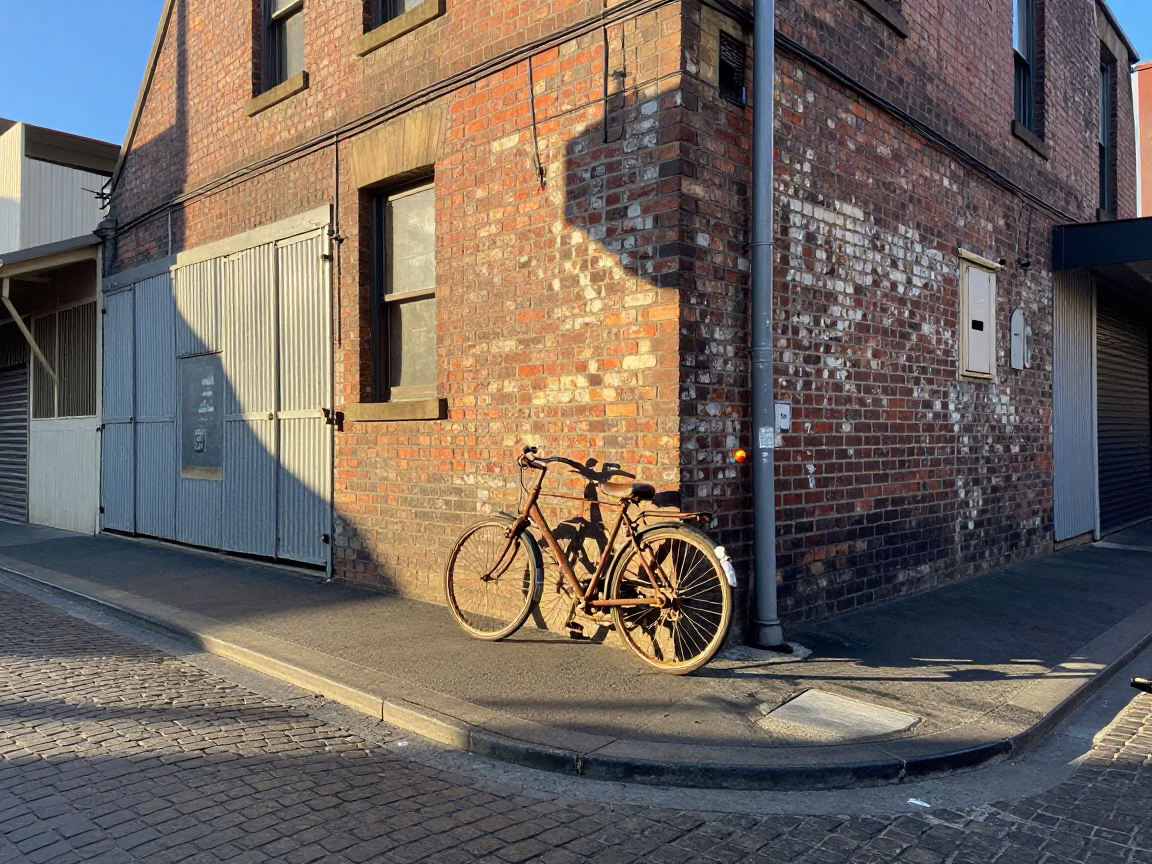 Morning Light on Melbourne Street Corner with Vintage Bicycle and Terracotta Bowl in in Melbourne, Victoria, Australia
