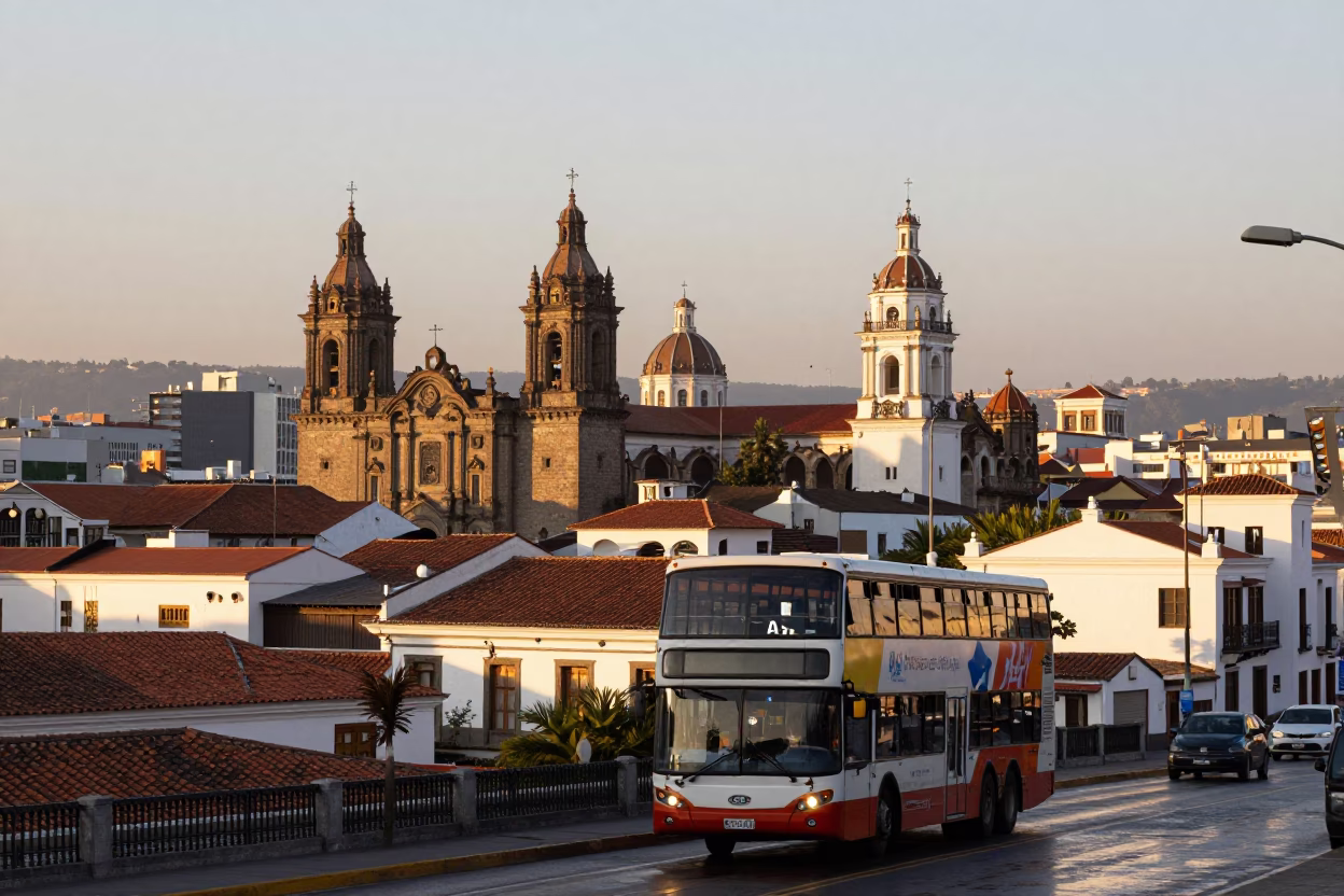 Morning Light on Quito Cityscape with Double-Decker Bus and Stone Architecture in in Quito, Ecuador