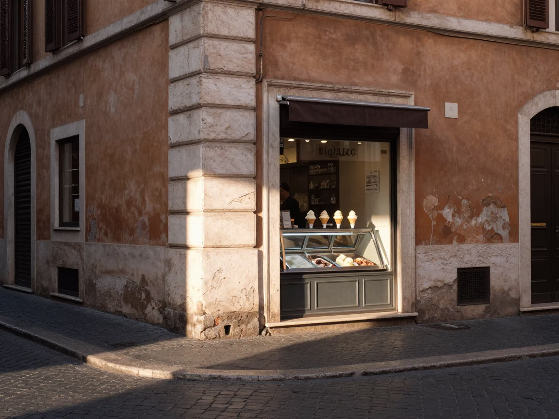 Morning light on Roman street corner with gelato display and peg rails in in Rome, Italy