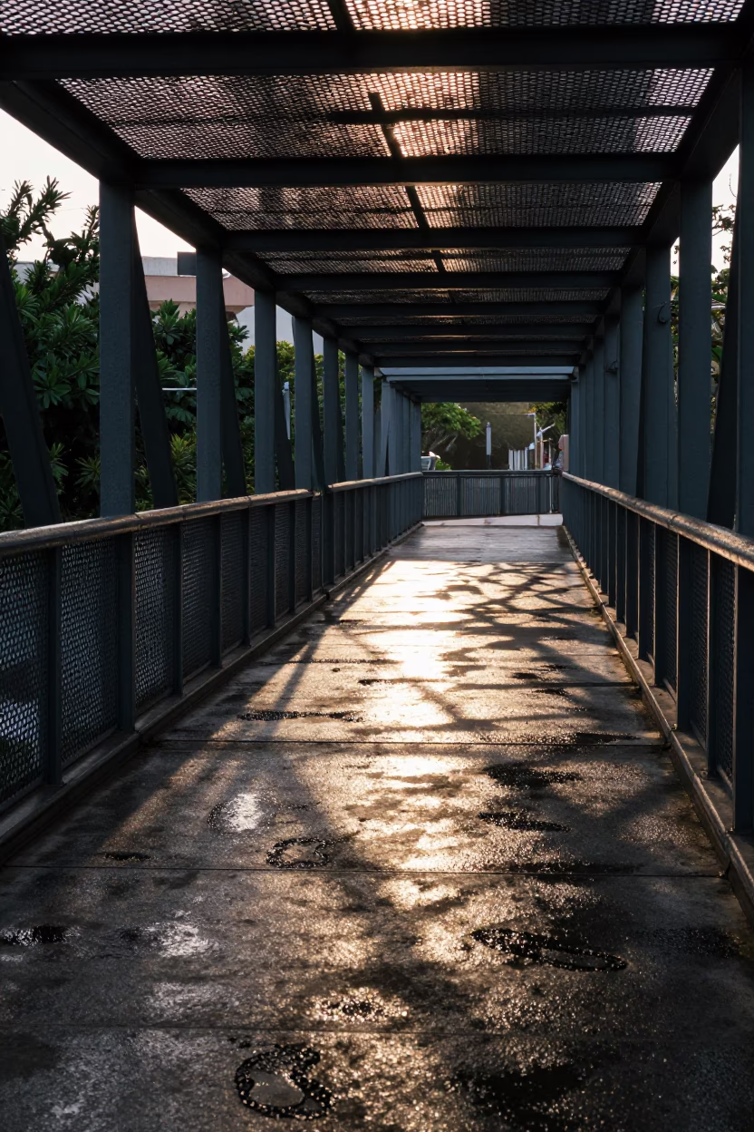 Morning Light on Tainan Pedestrian Overpass with Wet Footsteps and Urban Detail in in Tainan, Taiwan