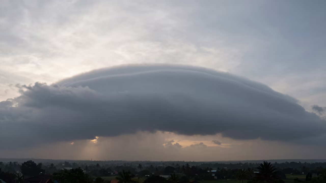 Morning Roll Cloud Over Kerala Thunderheads in over a horizon of stacked thunderheads in Kerala