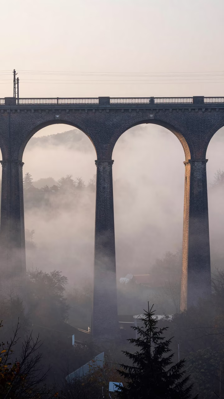Morning Steam Haze Rising Above Railway Arches in Budapest Hungary Just After Sunrise in in Budapest, Hungary