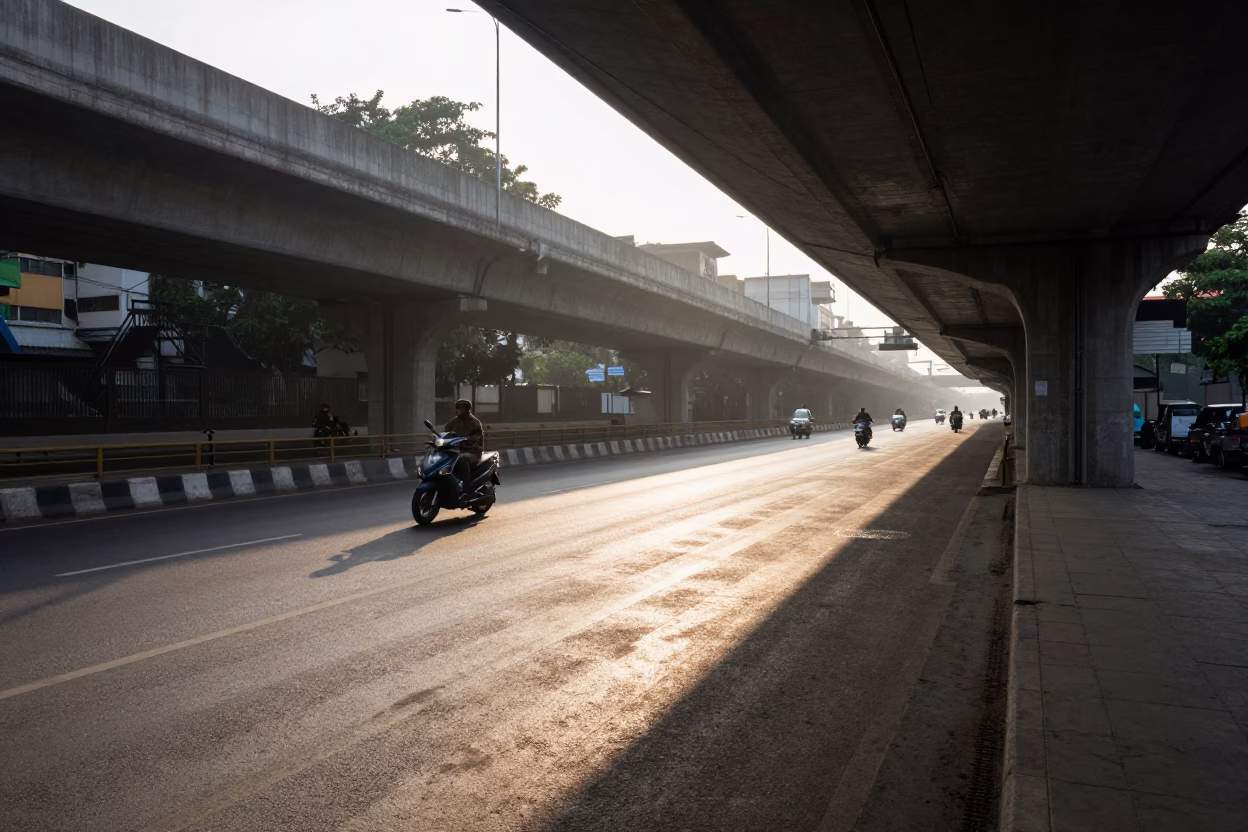 Morning Traffic Shadows Under Kolkata Flyover Concrete Infrastructure in in Kolkata, India