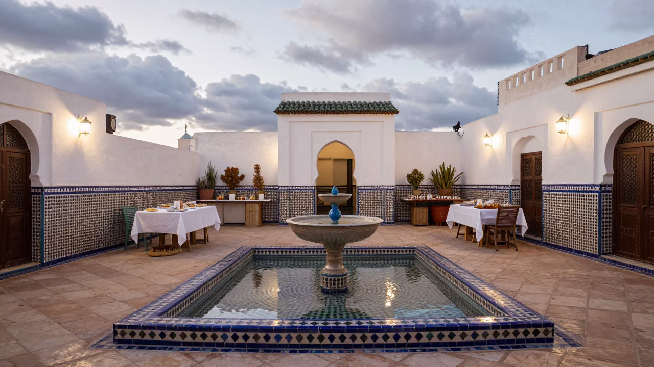 Moroccan Riad Terrace Breakfast Courtyard Reflections in in a courtyard prepared for breakfast service in Marrakech