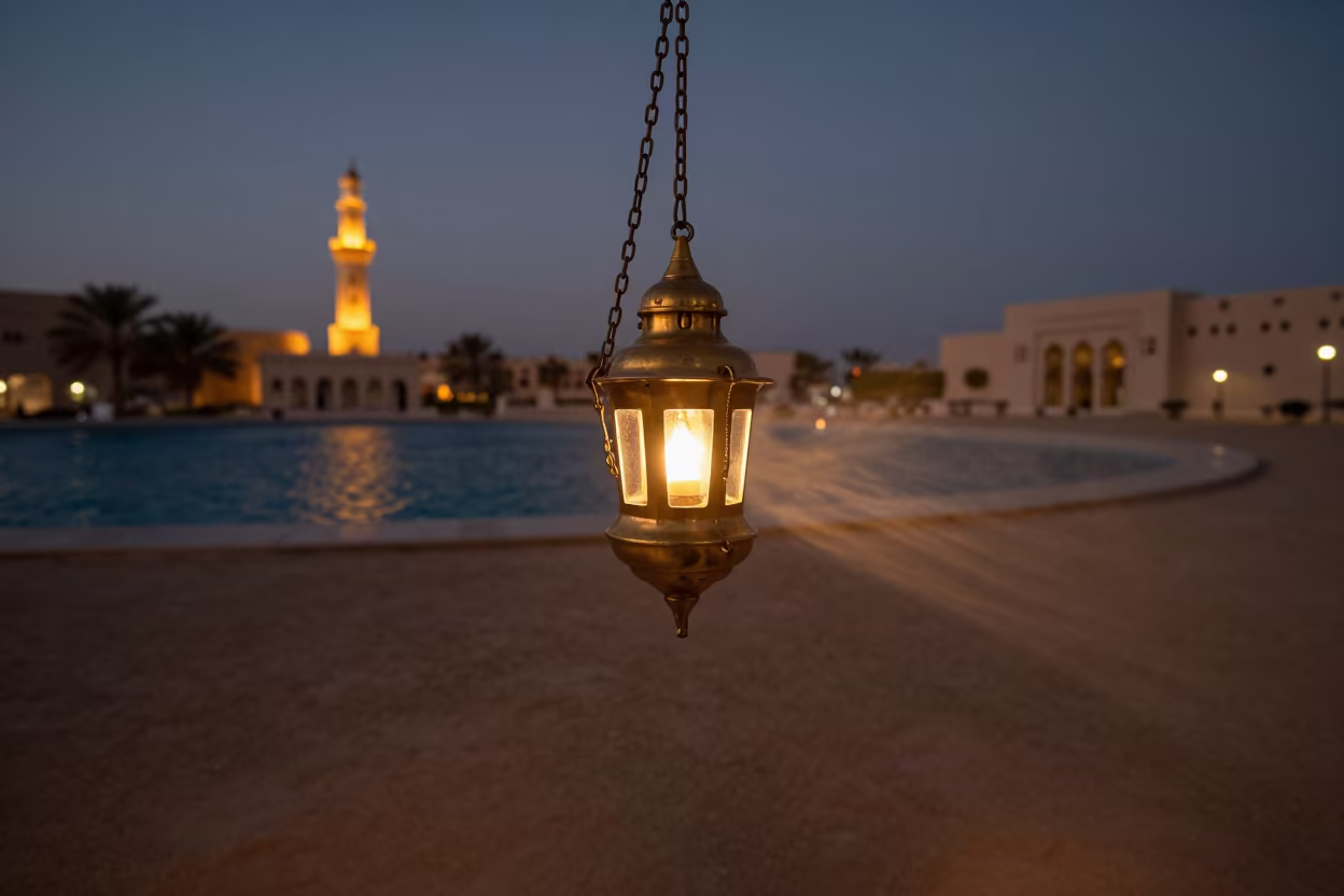 Mosque Lamp Swept by Amber Lighthouse Light in at the edge of a sacred pool near Muscat