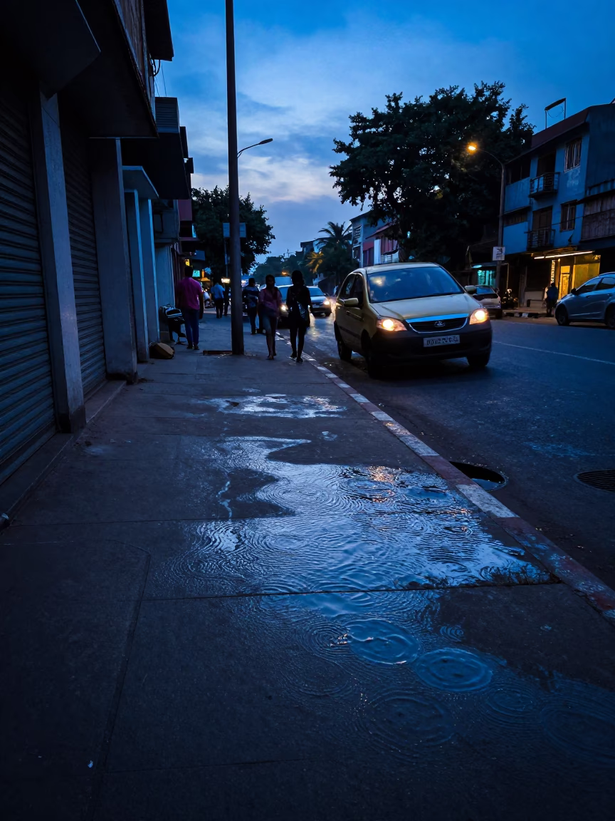 Mumbai Blue Hour Street Scene with Water Ripples on Concrete Pavement in in Mumbai, India