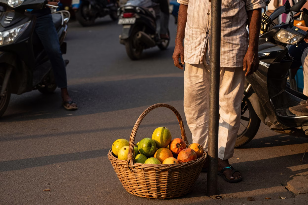 Mumbai Evening Street Scene with Wicker Basket and Sun Hat in Honeyed Light in in Mumbai, India