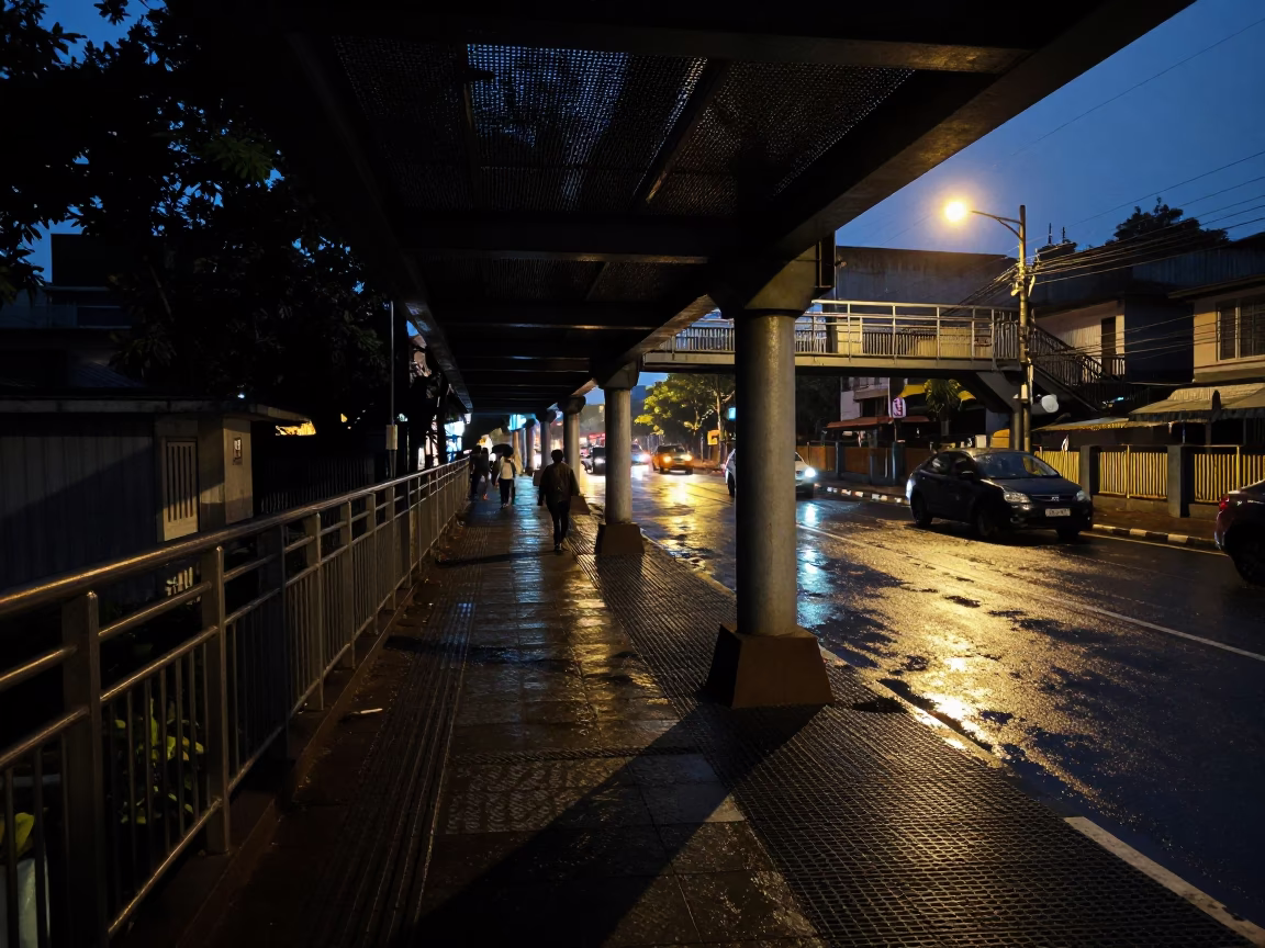 Mumbai India Predawn Street Scene with Pedestrian Overpass and Wet Footsteps in in Mumbai, India