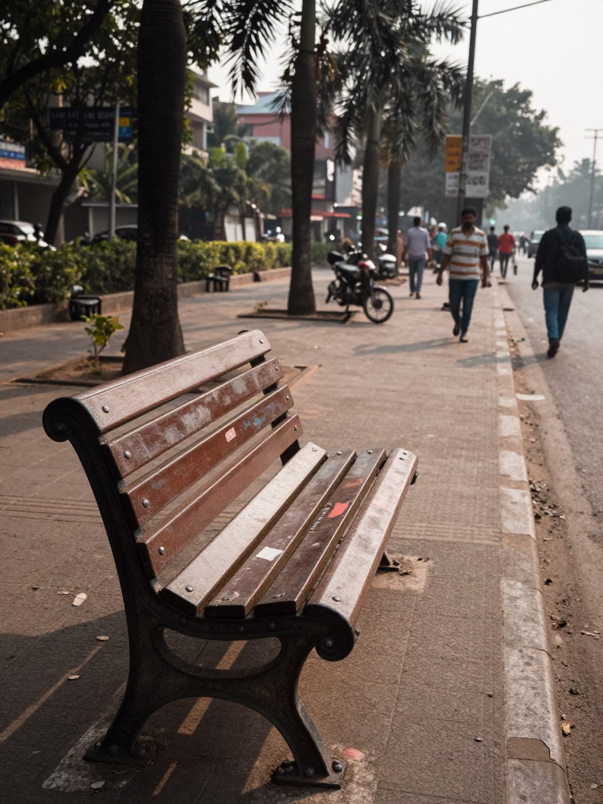 Mumbai Late Morning Street Scene with Smudges on Bench Slat and Local Activity in in Mumbai, India