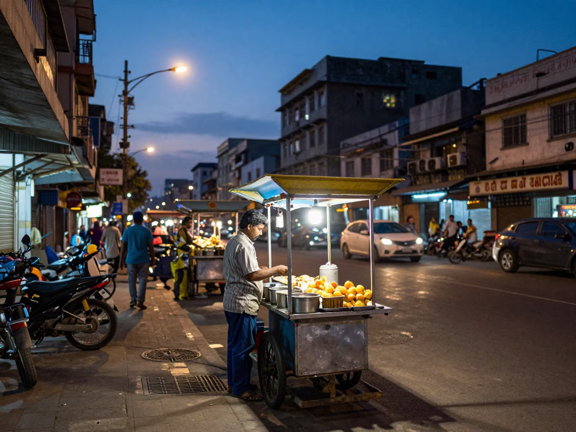Mumbai Street Scene at Dusk with Chai Stall and Urban Glow in in Mumbai, India