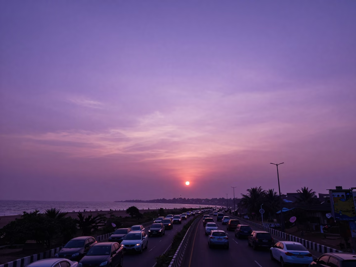 Mumbai Sunset Skyline View from Coastal Road with Traffic and Sea in in Mumbai, India
