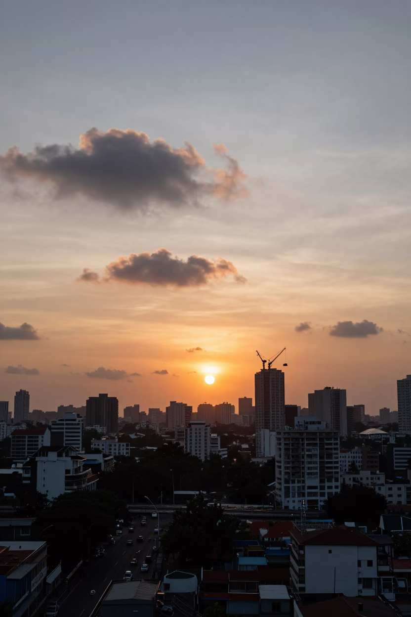 Mumbai Sunset Skyline with Morning Glory Clouds and Urban Street Life in in Mumbai, India