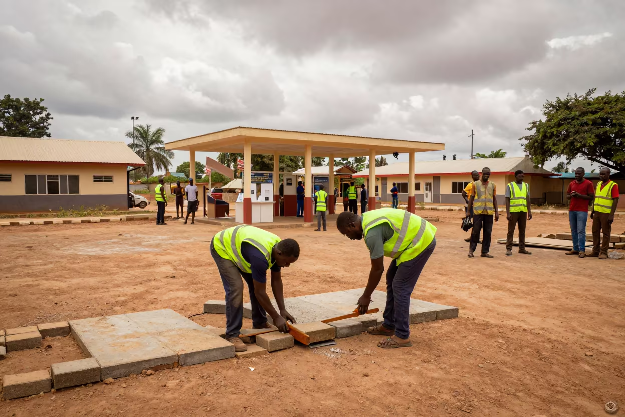 Municipal Crew Replacing Pavers at Kenema Polling Station in outside a polling station entrance in Kenema