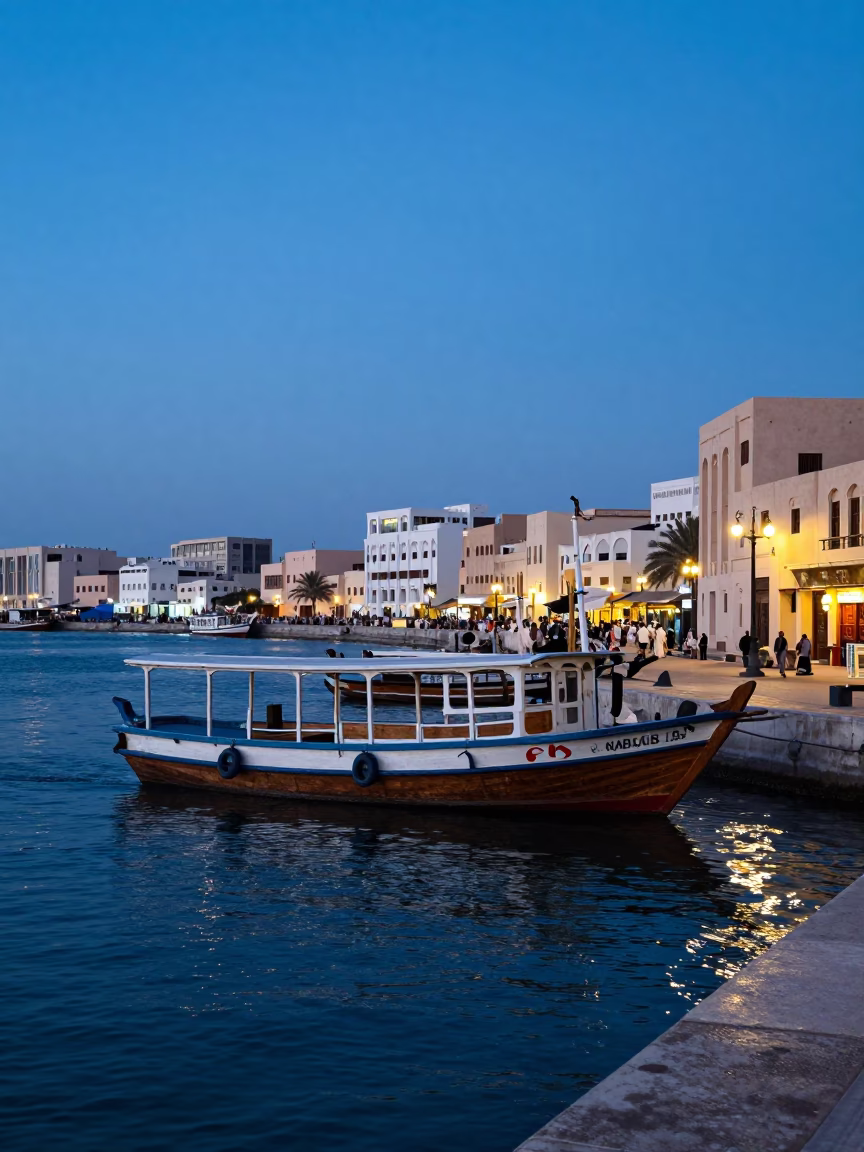 Muscat Oman Evening Street Scene with Mail Boat and Local Market Activity in in Muscat, Oman