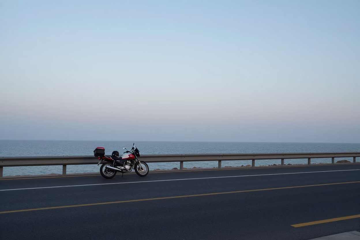 Muscat Oman Nautical Dawn Coastal Highway Motorcycle Travel Scene in in Muscat, Oman