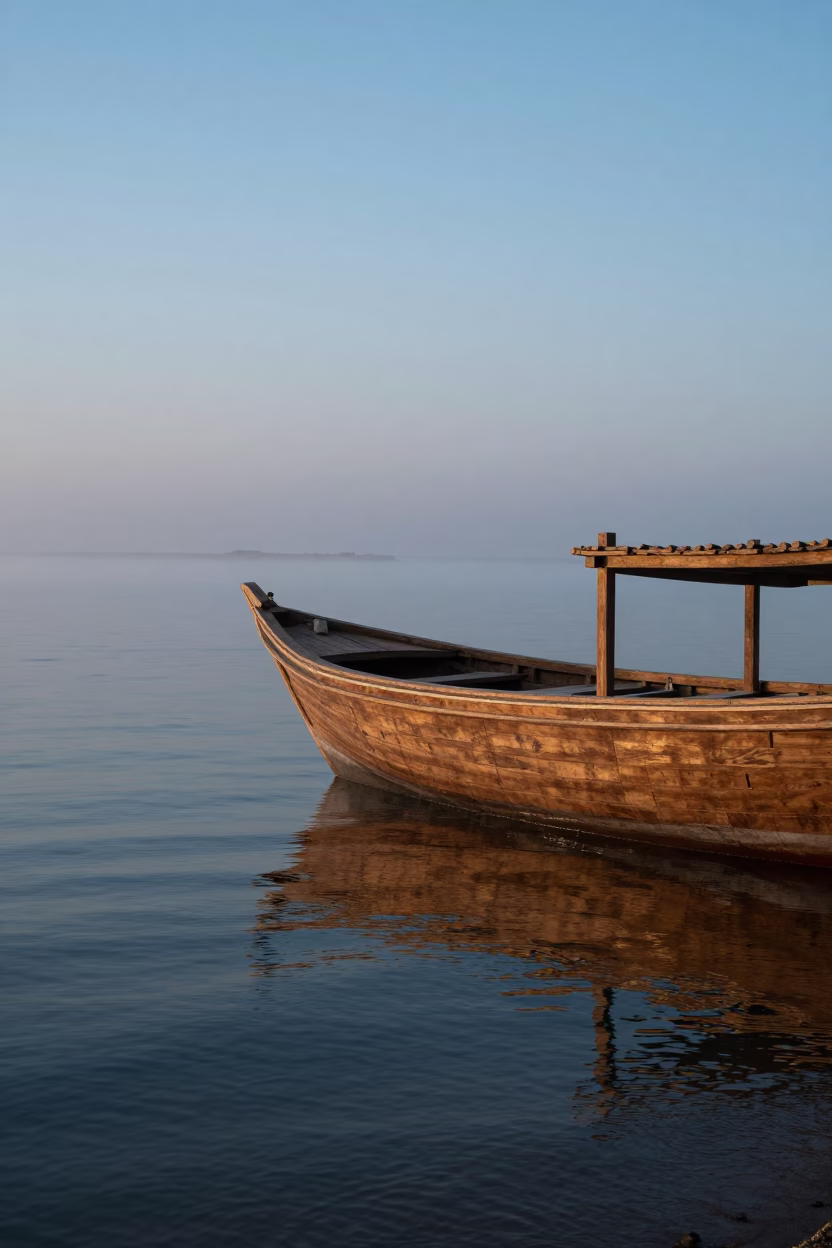 Muscat Oman Nautical Dawn Light Reflecting Off Traditional Wooden Dhow Hull Near Corniche in in Muscat, Oman