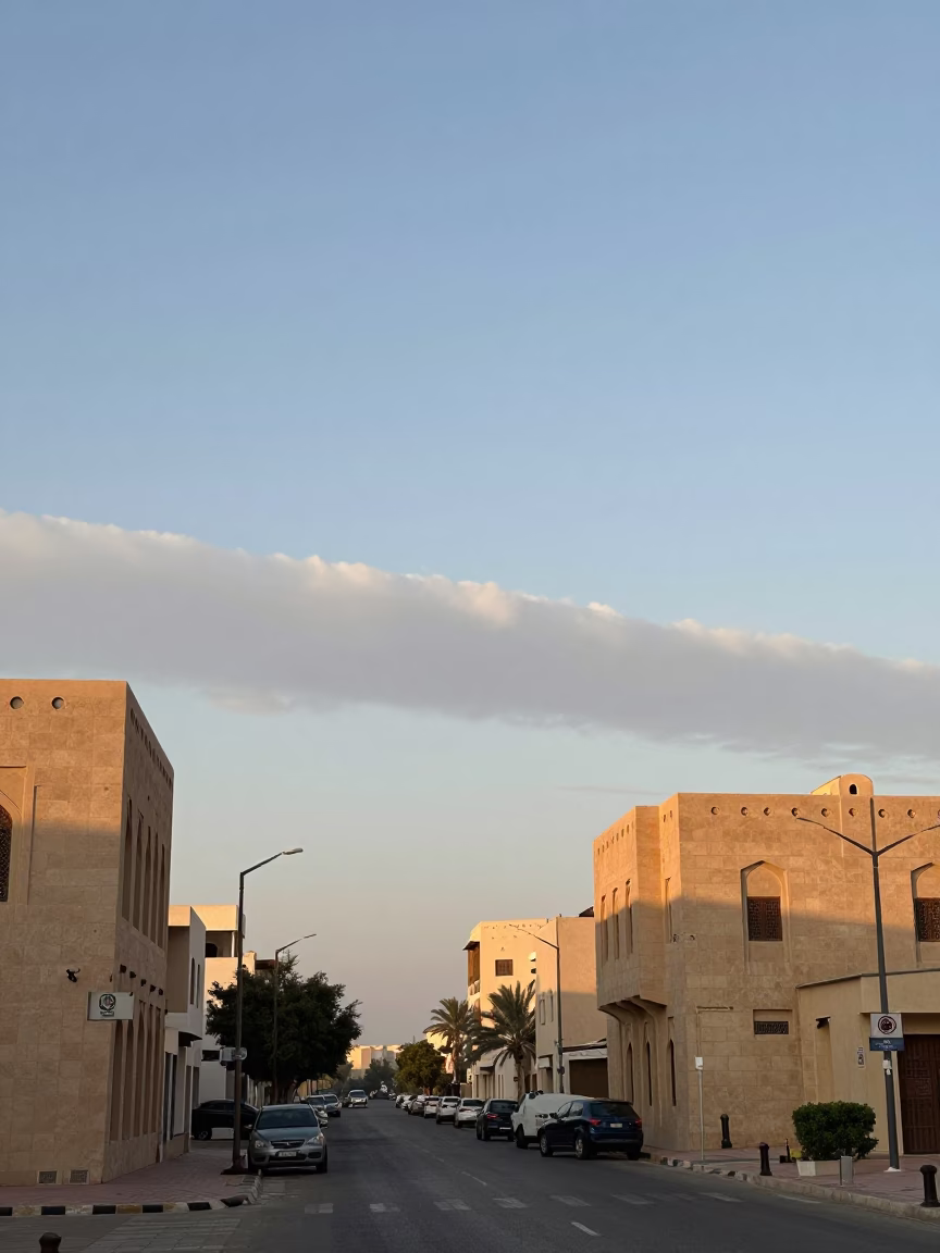 Muscat Oman Street Scene Morning Glory Clouds and Local Life After Sunrise in in Muscat, Oman
