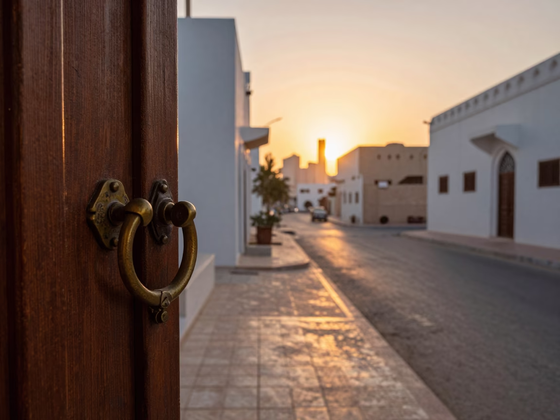 Muscat Oman Sunset Street Scene with Gate Handle and Local Interaction in in Muscat, Oman
