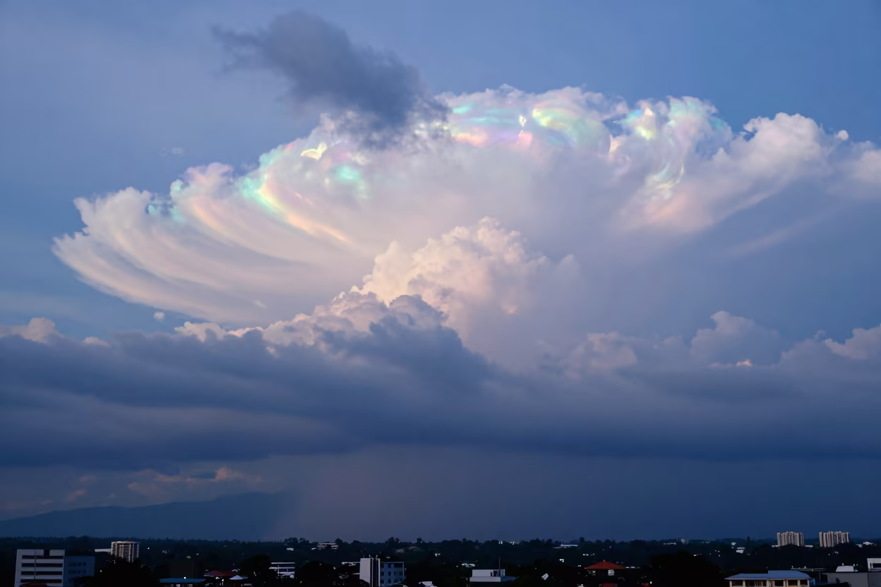 Nacreous Clouds Over Quezon City Twilight in over a horizon of stacked thunderheads near Quezon City