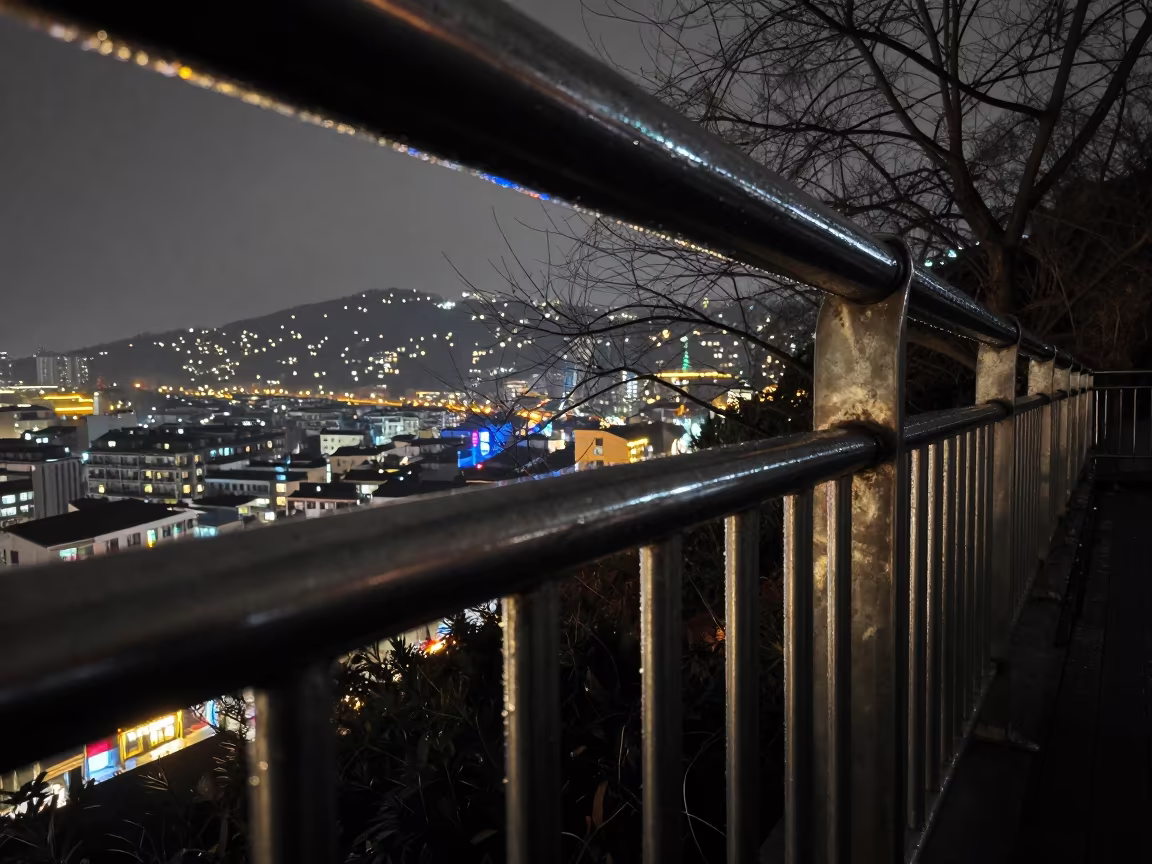 Nanjing Hillside City Lights on Pier Railing in on a pier railing in Nanjing