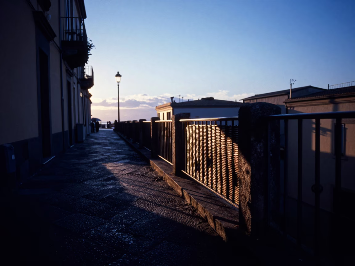 Naples Italy Pre-Dawn Street Scene with Wicker Shadow on Rail and Cooking Pot in in Naples, Italy