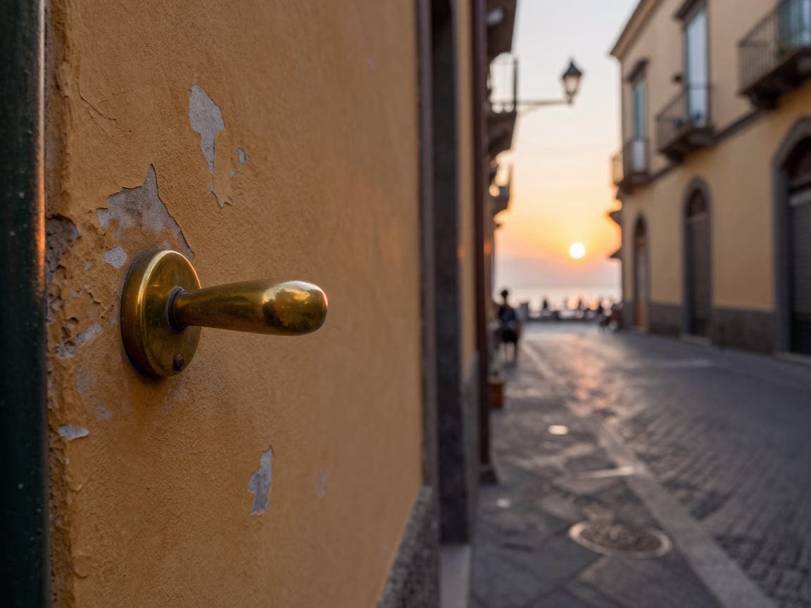 Naples Italy street scene with door handle and local architecture at sunset in in Naples, Italy