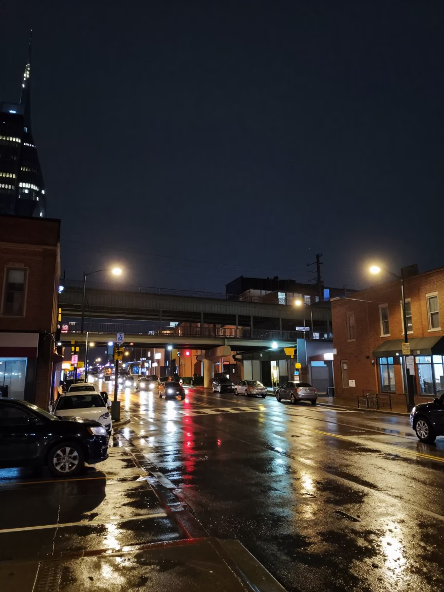Nashville Tennessee Night Street Scene with Overpass Interchange and Wet Asphalt Reflections in in Nashville, Tennessee, United States
